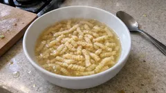 Passatelli in Brodo: Tender Parmesan “Noodles” Cooked Right in Homemade Capon Broth