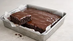 Easy brownies with glossy chocolate glaze (no mixer needed)
