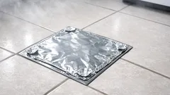 The aluminum foil drain trick that can stop bathroom odors fast