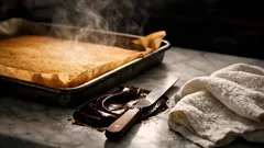 Easy chocolate Swiss roll with cream cheese frosting (no cracks)