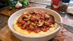 Creamy Polenta with Sausage and Mushrooms in Tomato Sauce—Cozy Weeknight Dinner